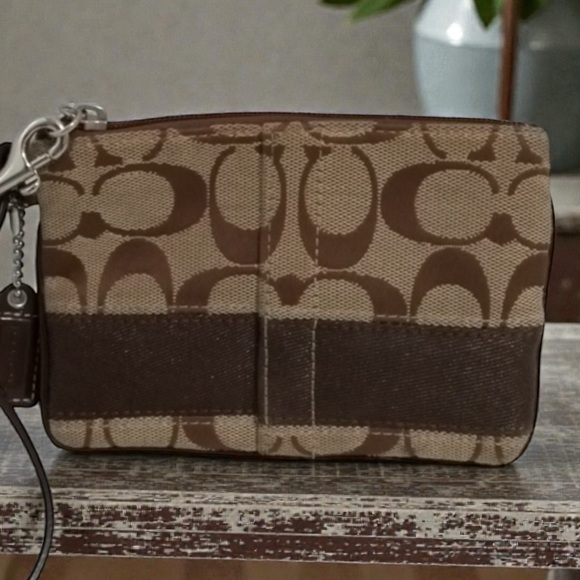 Coach Handbags - Signature Coach Tan and Brown Wristlet in Excellent Condition